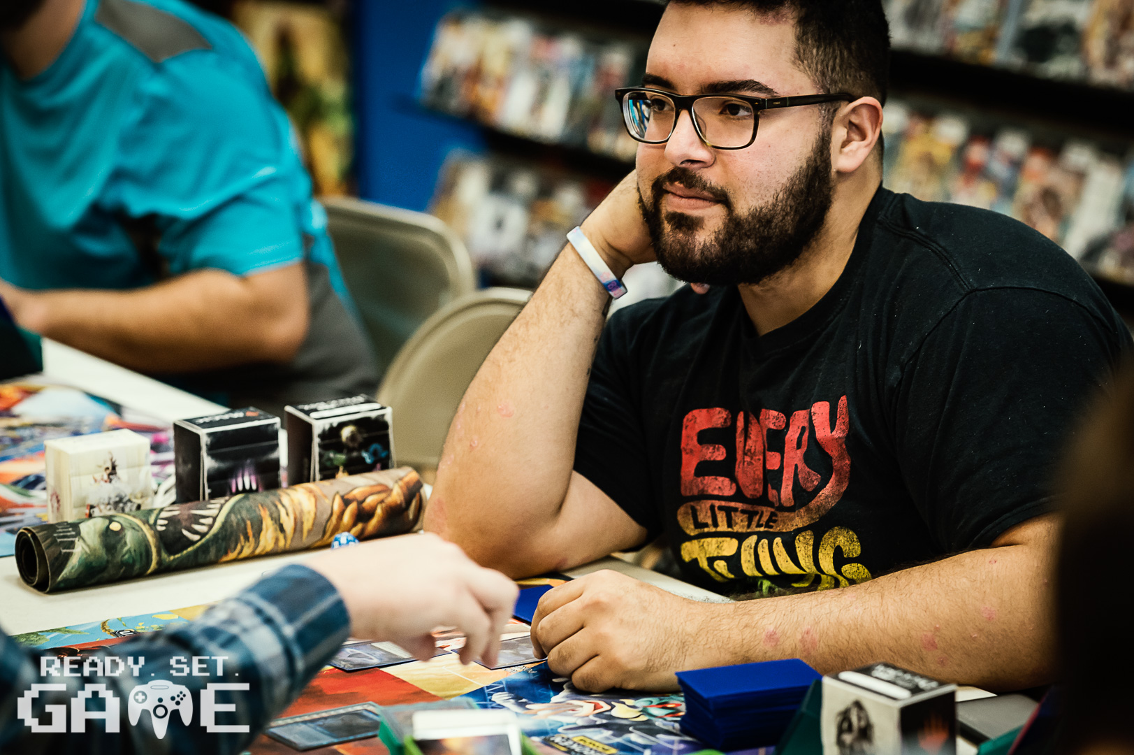 Ready set game Magic the gathering tournament player shot.